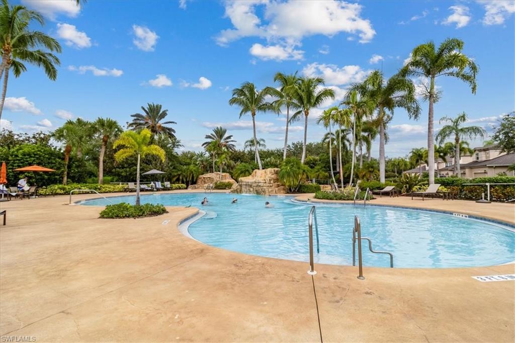 Community pool featuring a patio area