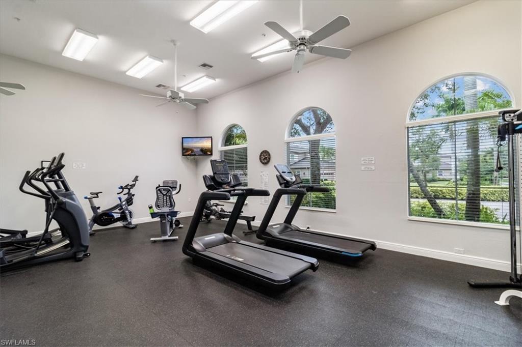 Exercise room featuring ceiling fan
