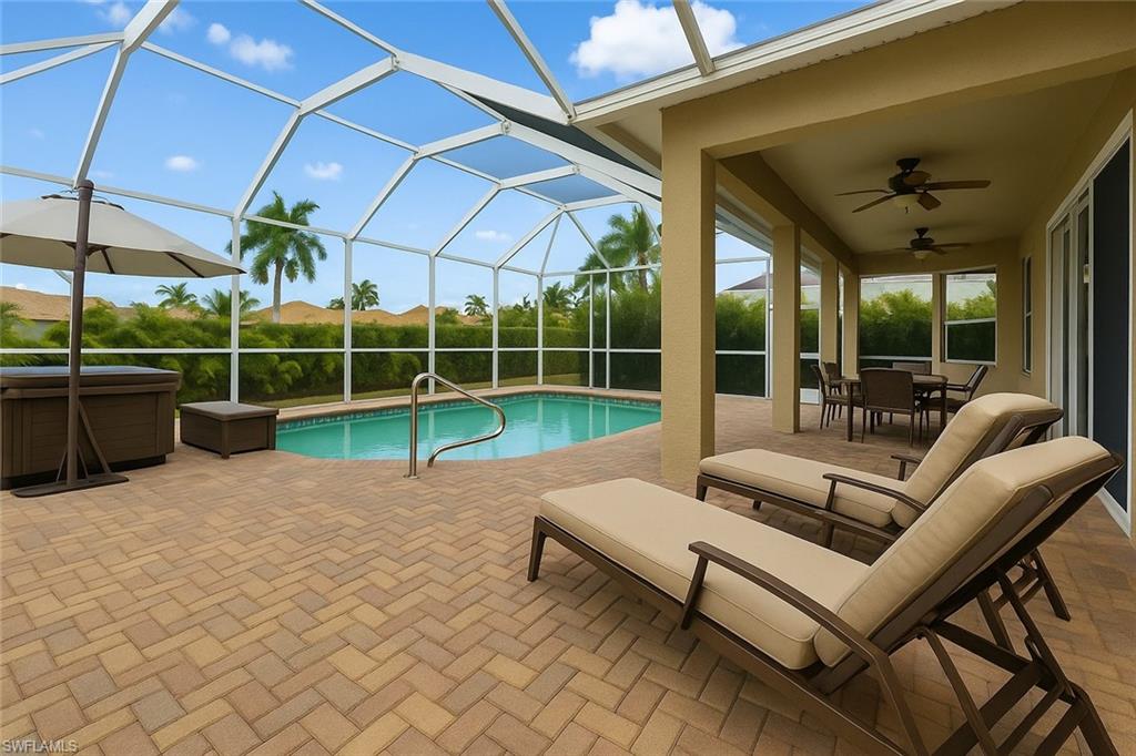 Virtually Staged Lanai. Chevron pavers, Complete privacy is with the mature landscaping!