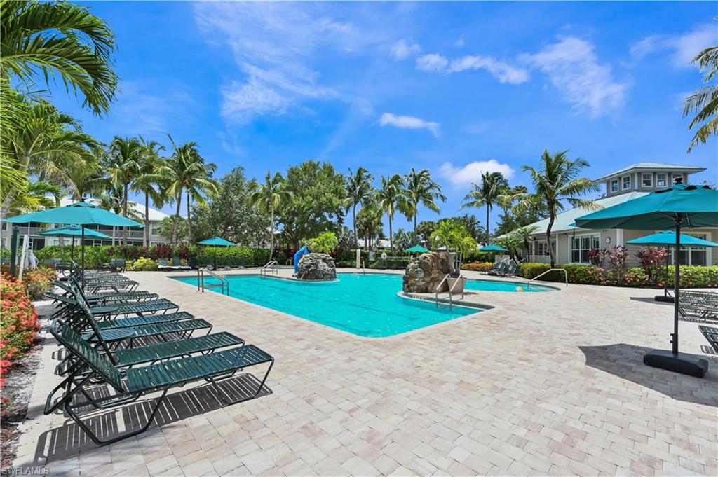 Community pool featuring a patio area