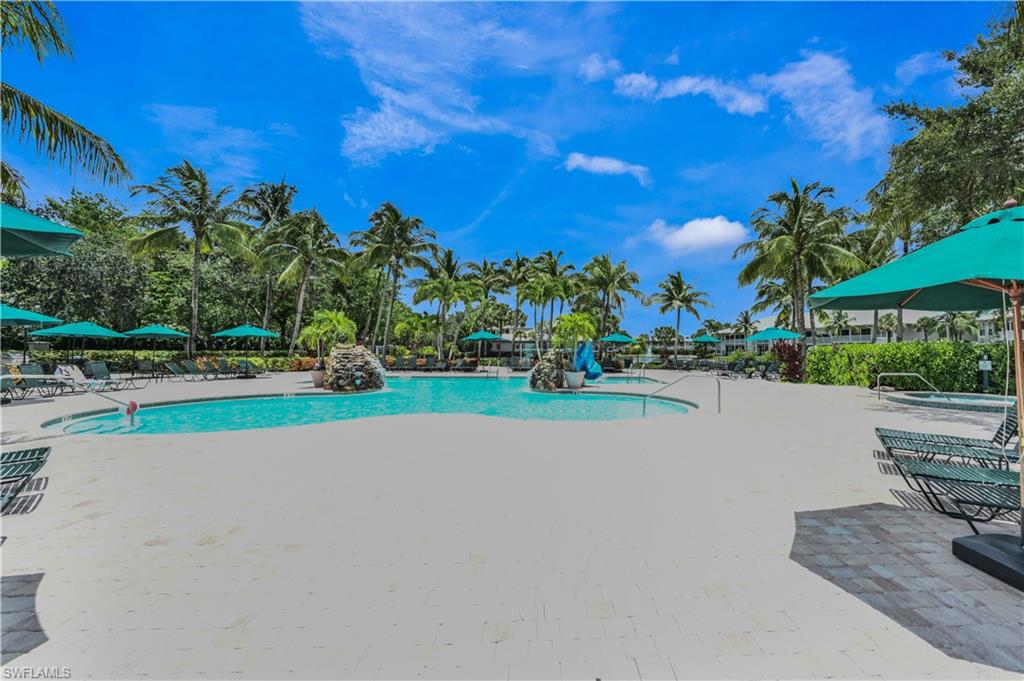 Community pool featuring a patio area