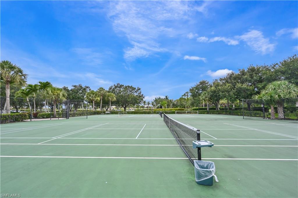 View of tennis court with community basketball court