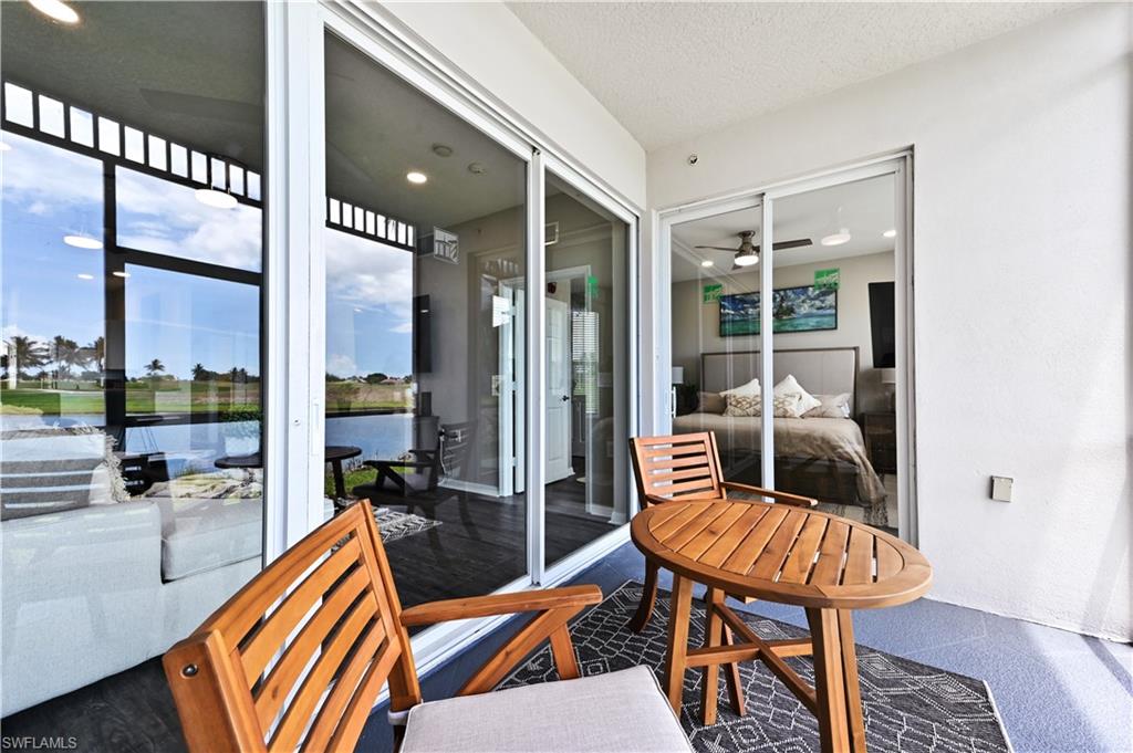 Sunroom with a water view
