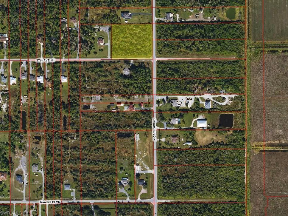 Aerial map of property and surrounding area featuring property parcel outlined