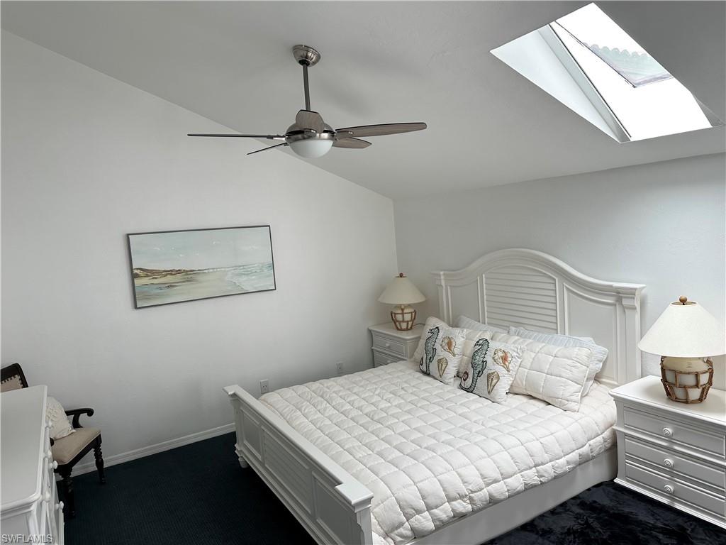 King bed, vaulted ceiling, remote skylight and ceiling fan