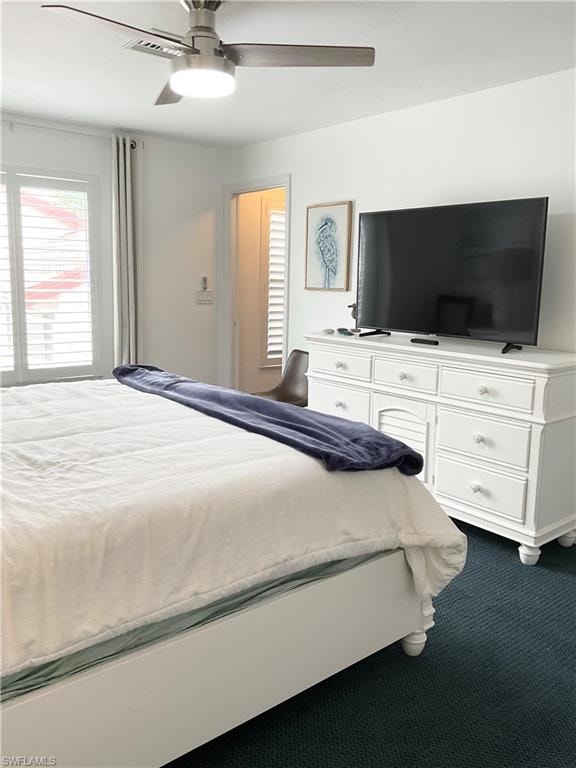 Primary bedroom has large screen smart TV for streaming