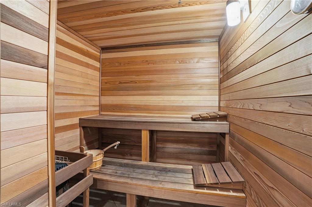 Sauna / steam room featuring wooden ceiling and wood walls - Virtually Edited Image