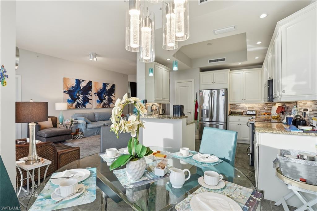 Dining space featuring recessed lighting and a raised ceiling - Virtually Edited Image