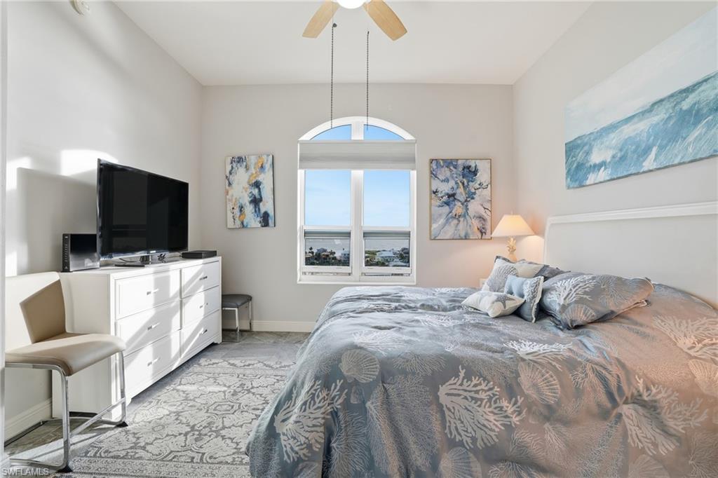 Bedroom featuring Gulf views - Virtually Edited Image