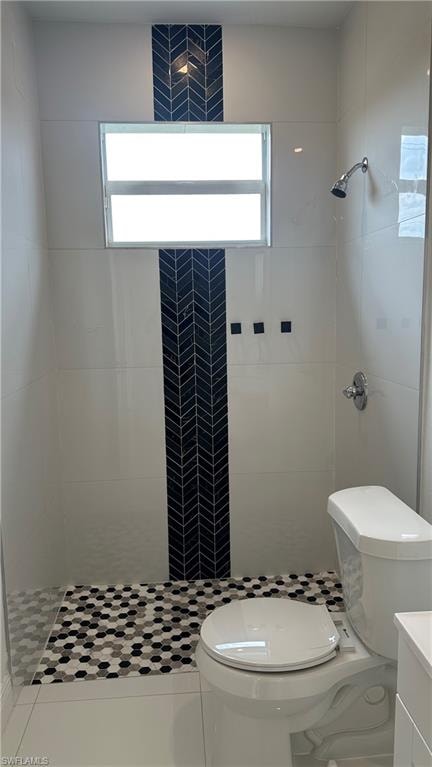 Full bath with a stall shower and vanity