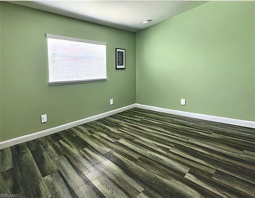 check this out  Bedroom featuring wood-type flooring VIRTUALLY EDITED