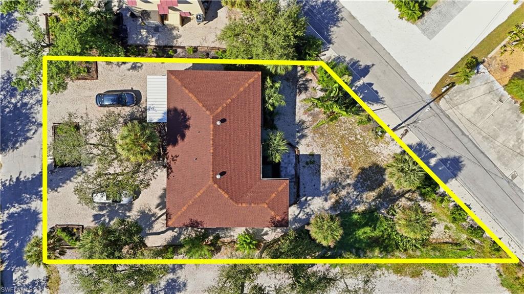 View of subject property featuring property boundaries highlighted - Virtually Edited Image