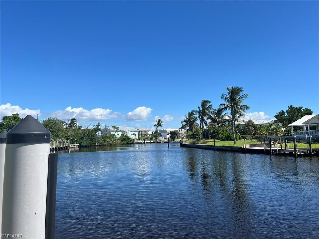 Water view with a boat dock