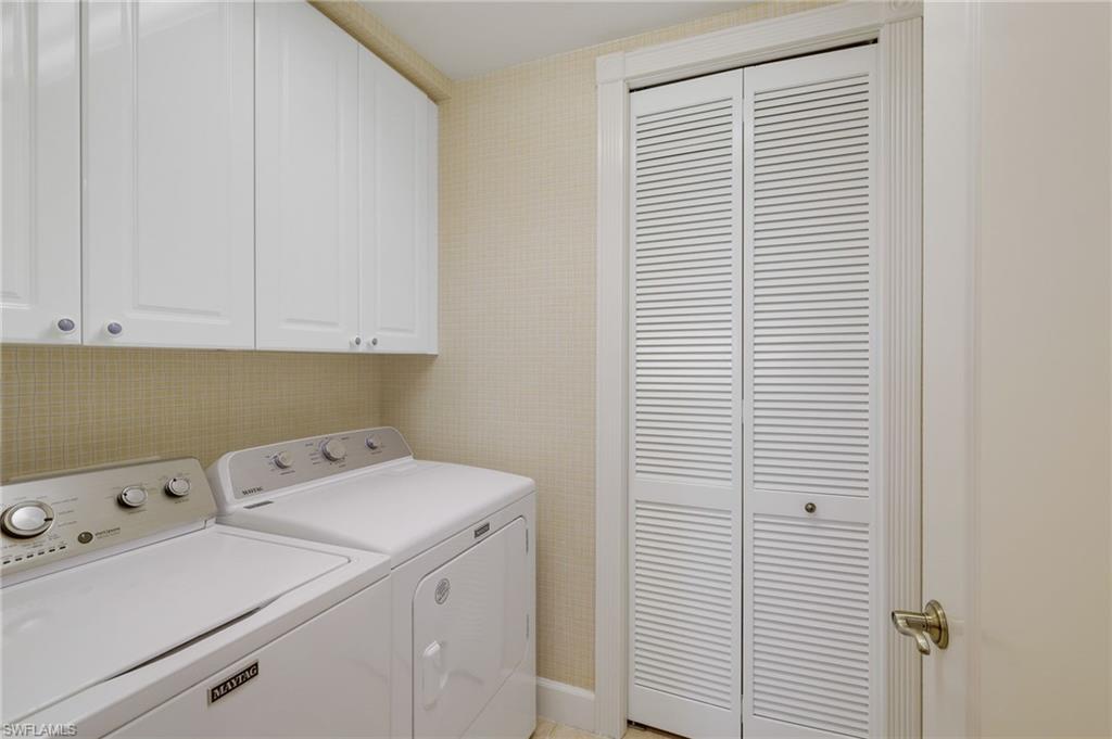 Guest Half Bathroom featuring vanity with open storage.