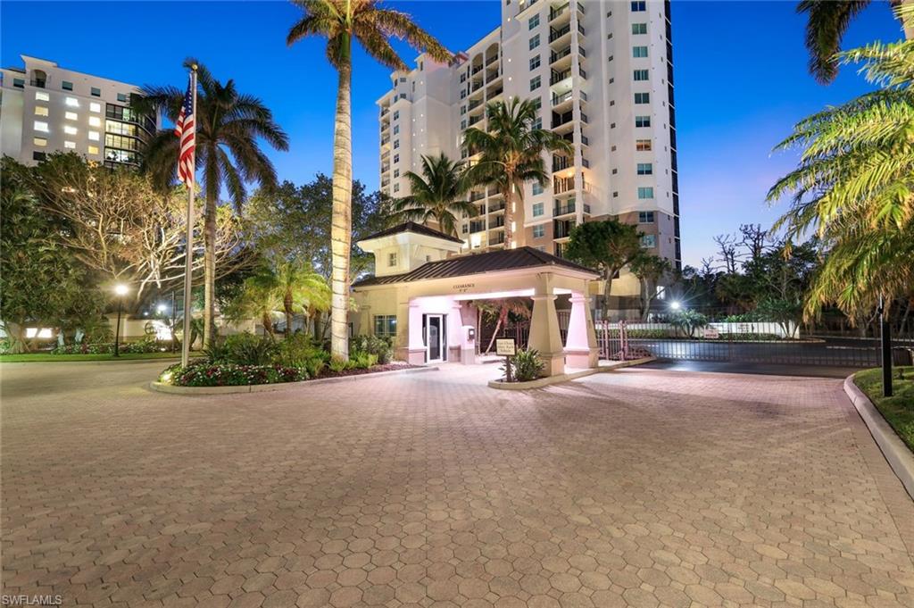 Beautifully landscaped gated entry into Cove Towers.