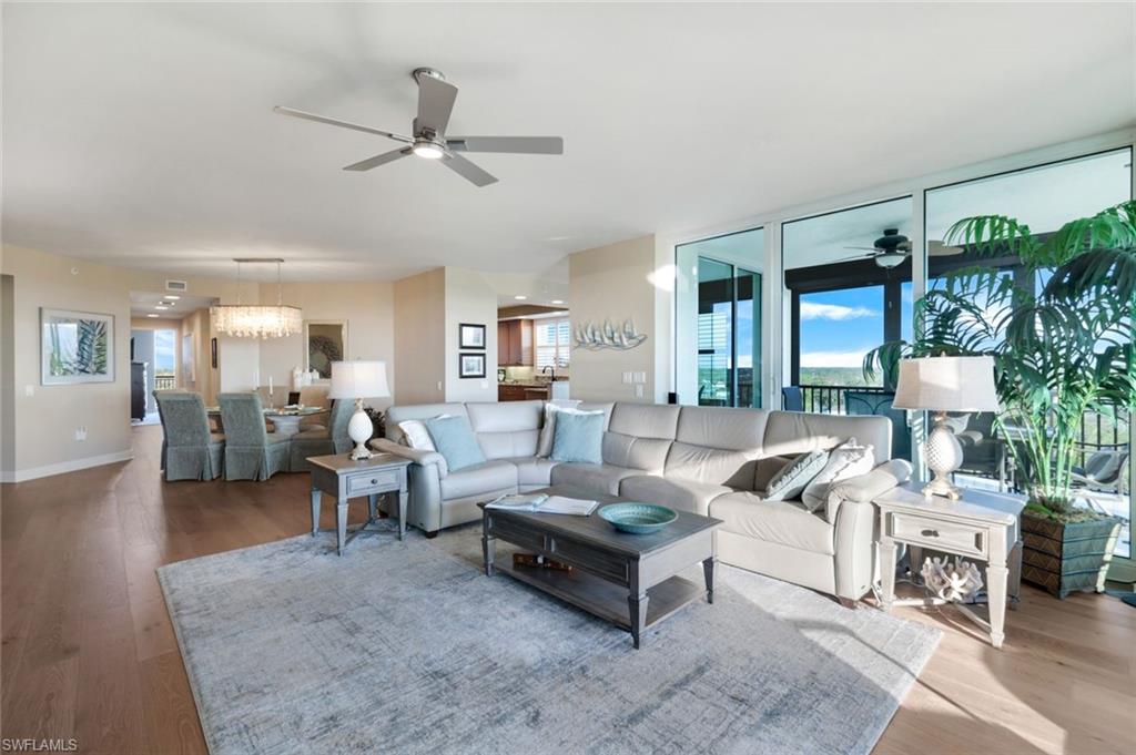 Spacious grand salon with floor to ceiling sliding glass doors and gorgeous views.