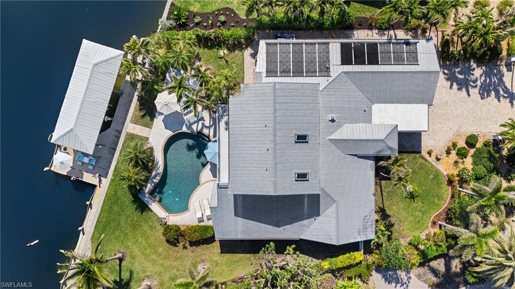 Drone / aerial view featuring a water view Virtually enhanced image