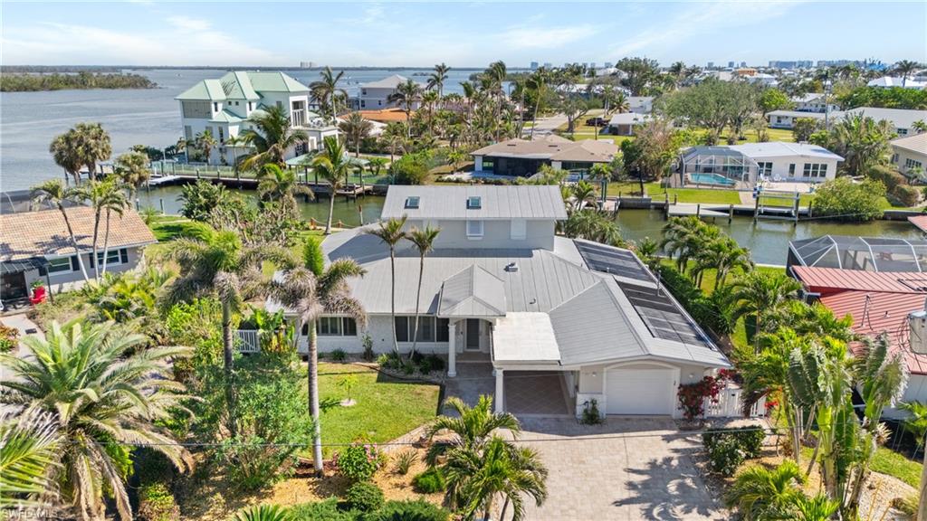 Bird's eye view featuring a water view -Virtually enhanced image