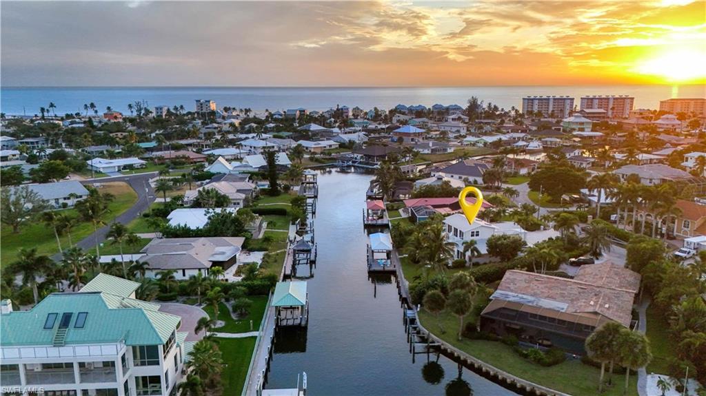 Drone / aerial view featuring a water view Virtually enhanced image