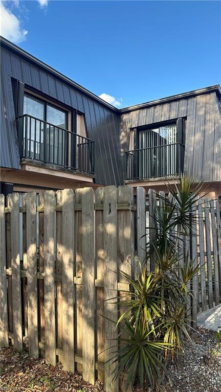 View of home's exterior featuring a balcony
