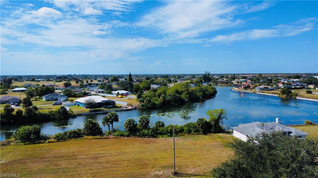 Water view with nearby suburban area