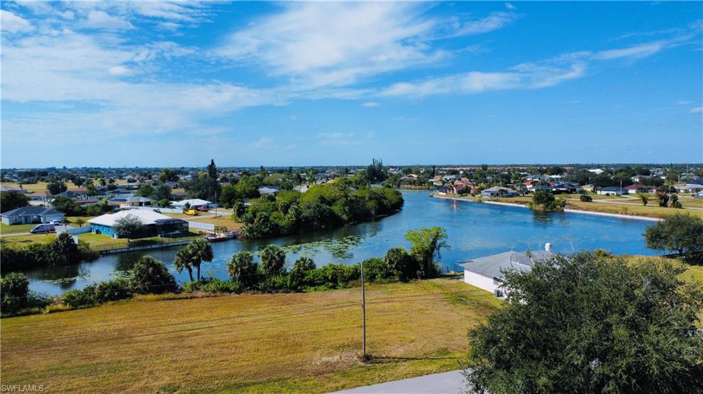 Water view featuring nearby suburban area