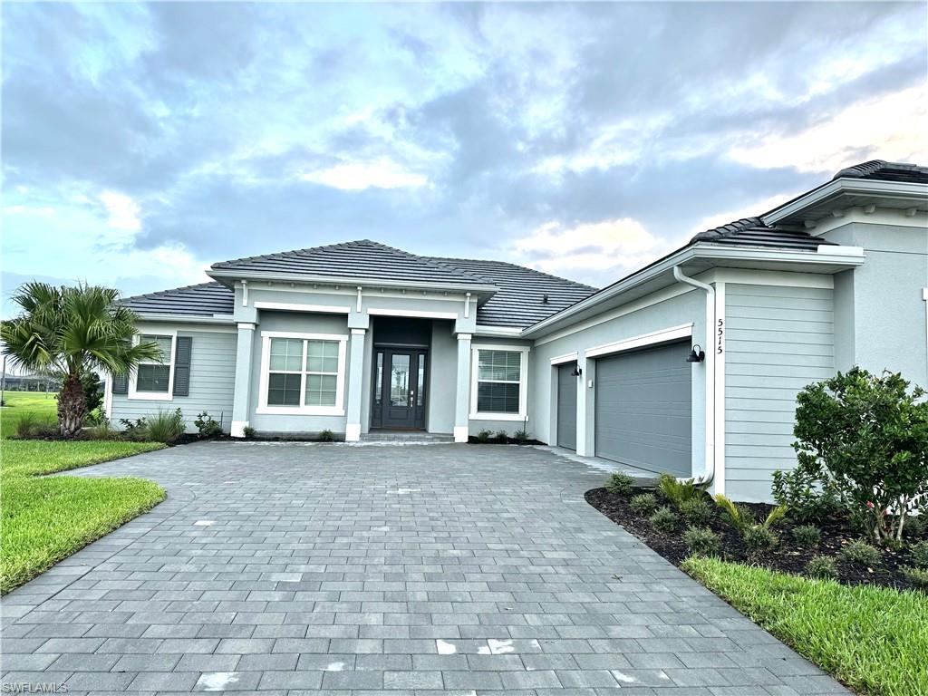 View of front of house with a garage