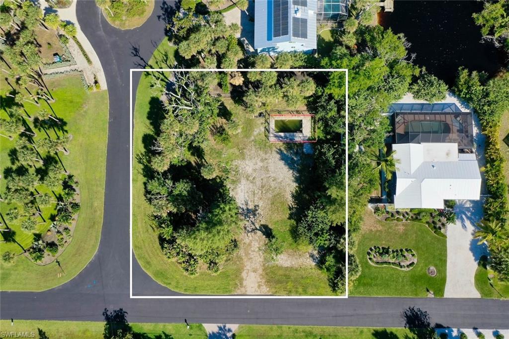 Aerial view of property's location featuring property parcel outlined