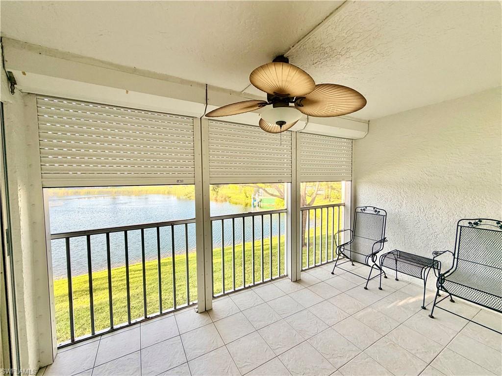 Enclosed balcony with electric hurricane shutters