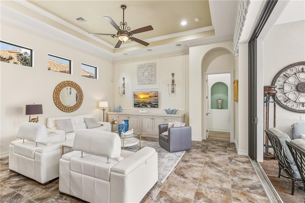 Family room with custom console, sliders open to pool