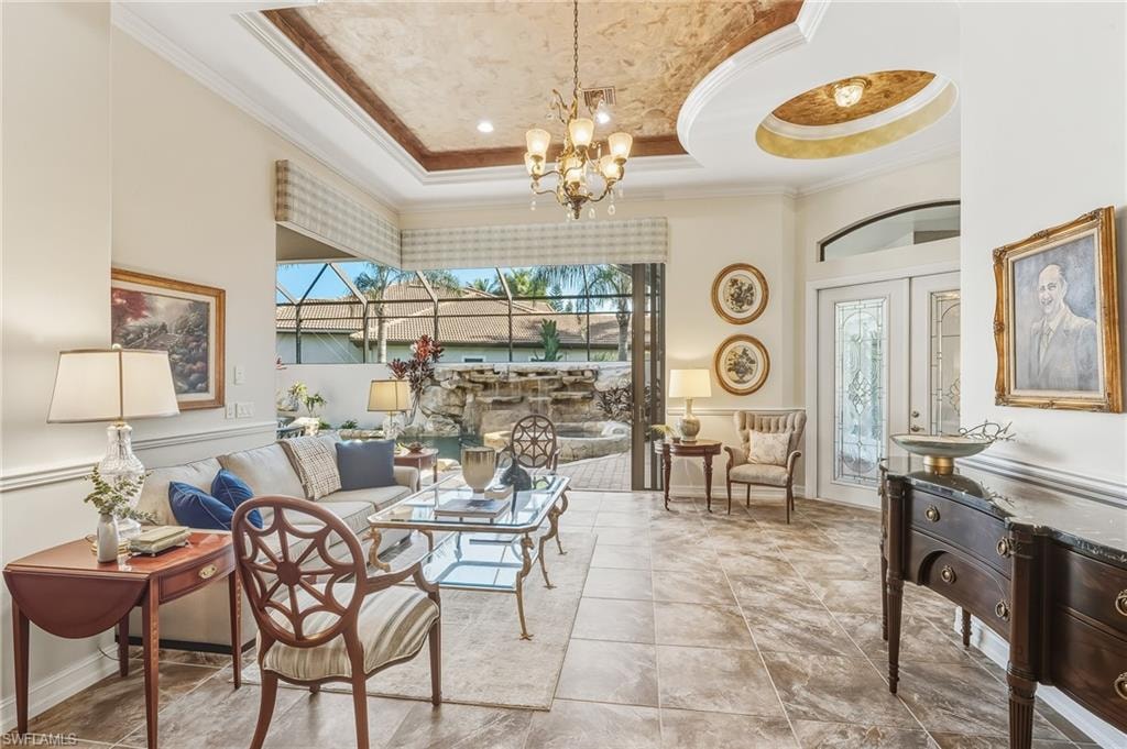 Living Room with view to pool and front door