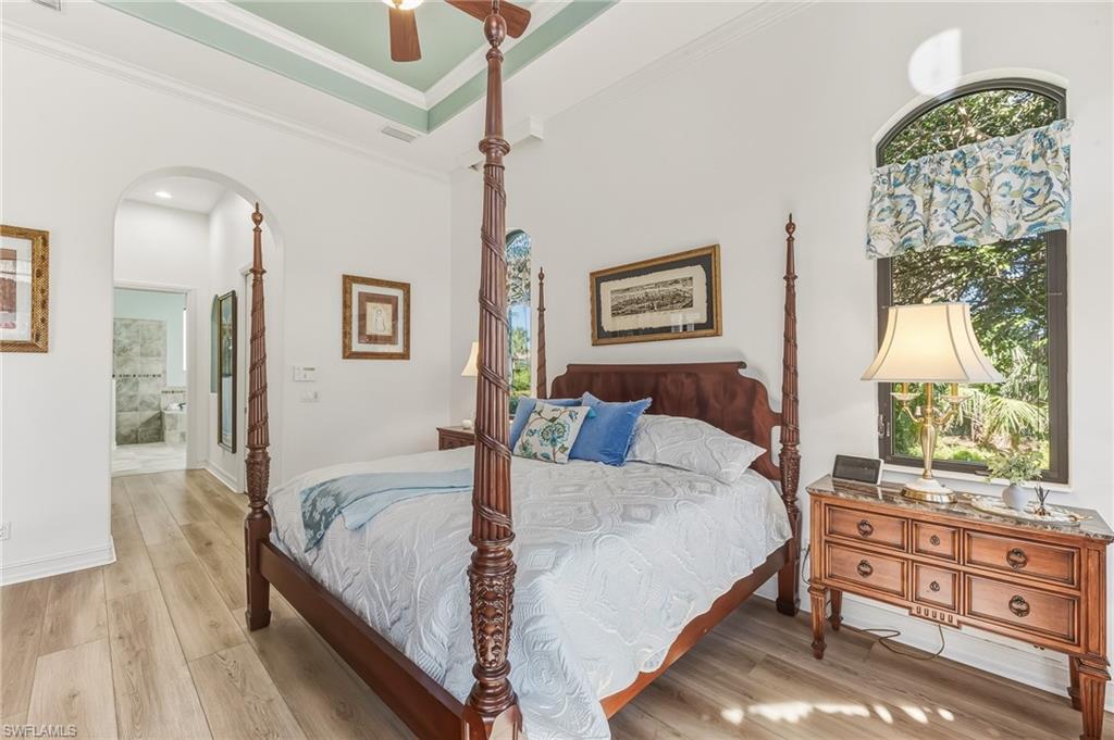 Primary bedroom with view to ensuite bath