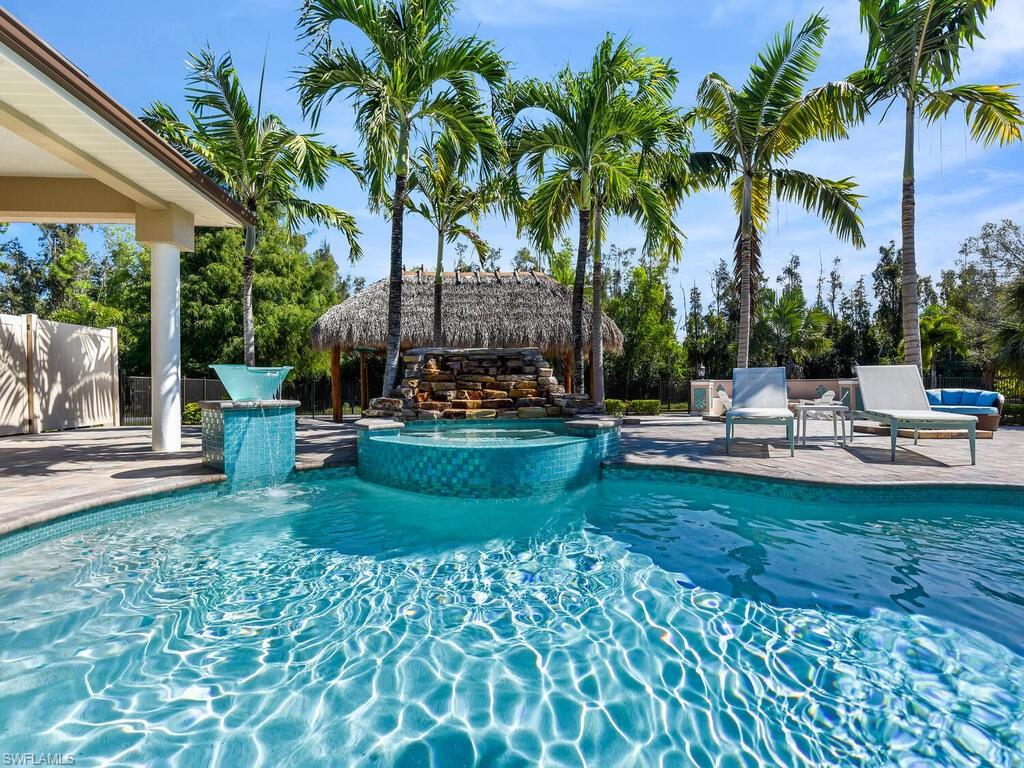 Custom Features Including Rock Waterfall & Fire Bowls