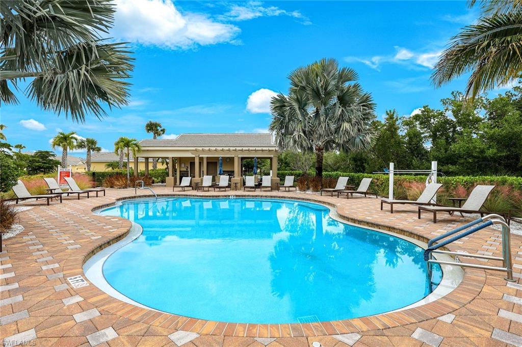 Community pool featuring a patio area