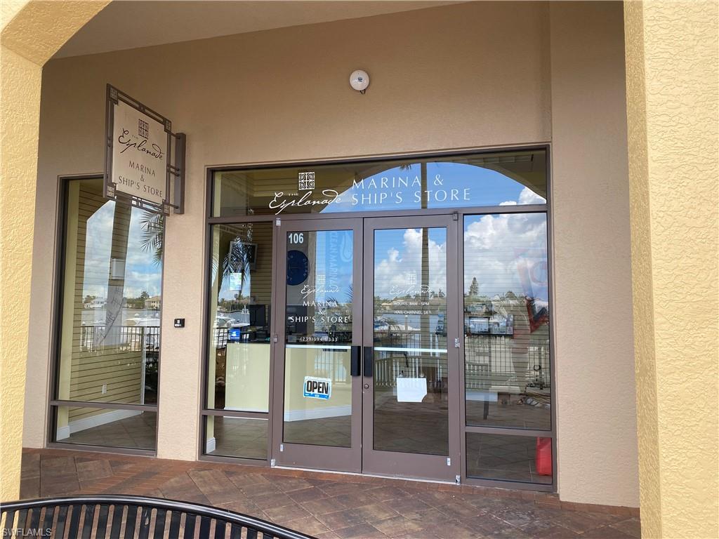 View of exterior entry featuring french doors and stucco siding