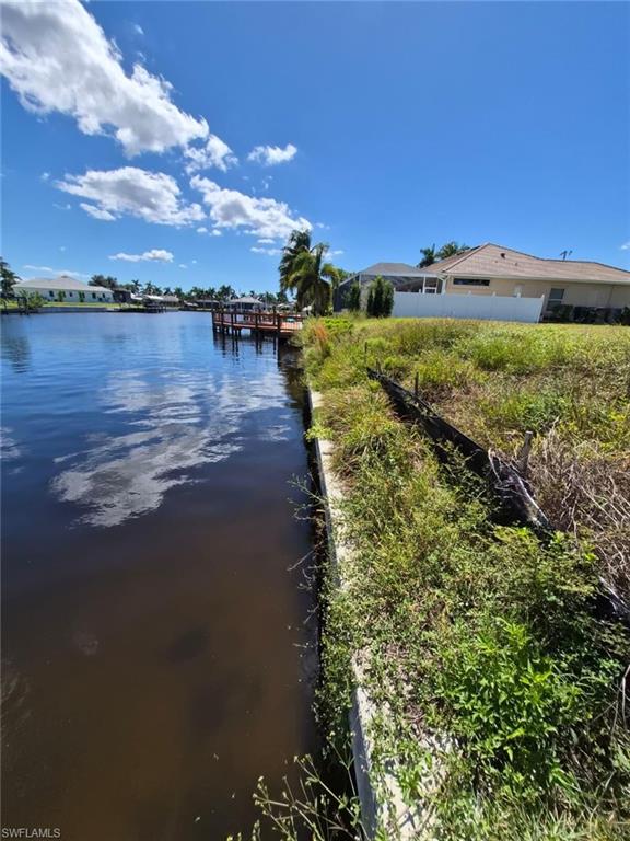 Water view featuring a boat dock