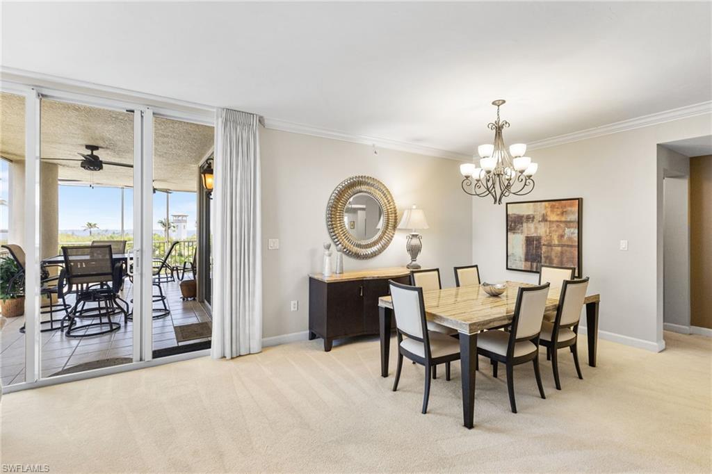 A refined formal dining space is seamlessly integrated within the open-concept layout, offering an elegant setting for both intimate dinners and sophisticated entertaining while maintaining a natural flow throughout the main living areas.