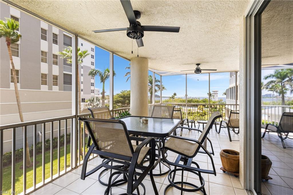 Enjoy captivating views of the river and marina entrance from your expansive lanai, where the beauty of waterfront living unfolds in a serene and picturesque setting.