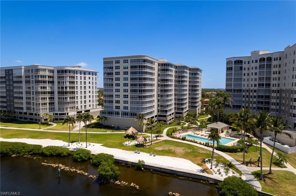 The Shores community delivers an elevated resort-style experience, featuring inviting tiki lounge areas and a private beach that embody relaxed sophistication and coastal luxury. Perfectly positioned at the mouth of the marina, the setting offers a front-row seat to watch boats glide gracefully in and out, creating a serene and captivating way to begin or end each day immersed in the Southwest Florida lifestyle.