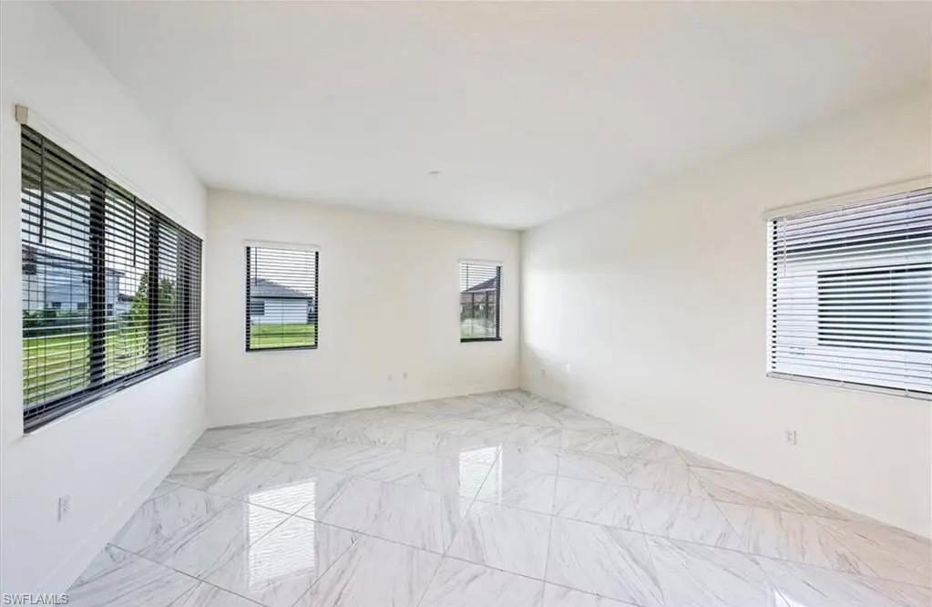 Empty room with light marble finish floors