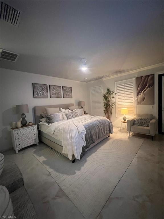 Bedroom featuring finished concrete flooring
