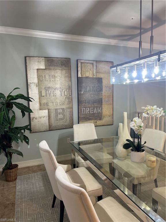 Dining room featuring crown molding