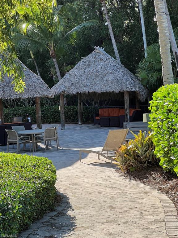 View of community featuring a gazebo and an outdoor hangout area