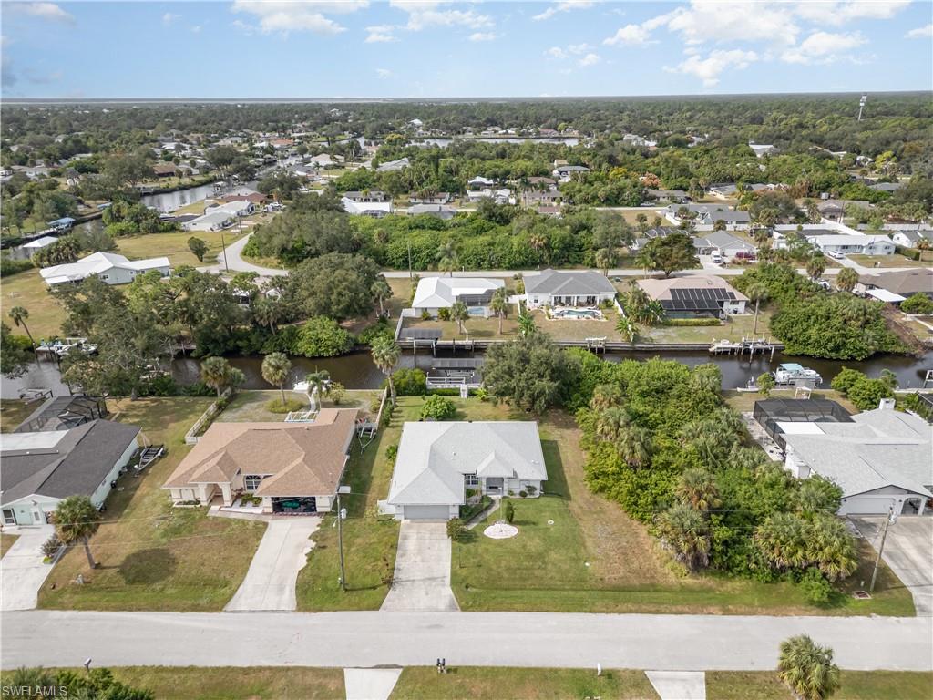 Aerial view of residential area with a large body of water
