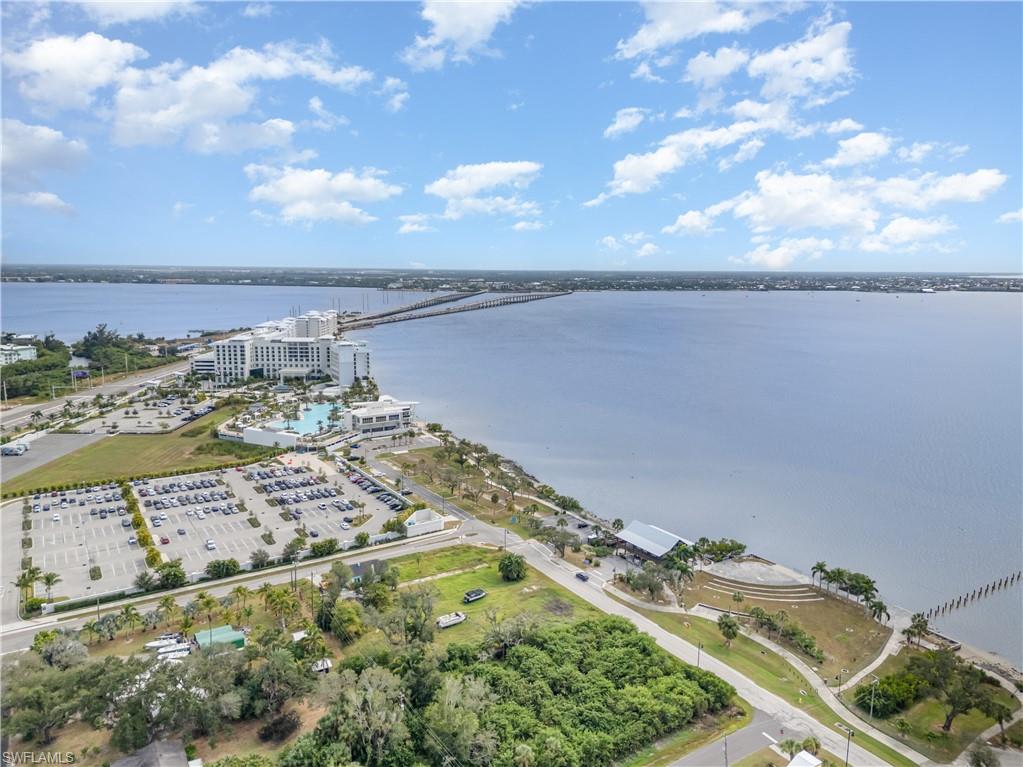 Bird's eye view of a notable bridge and a large body of water