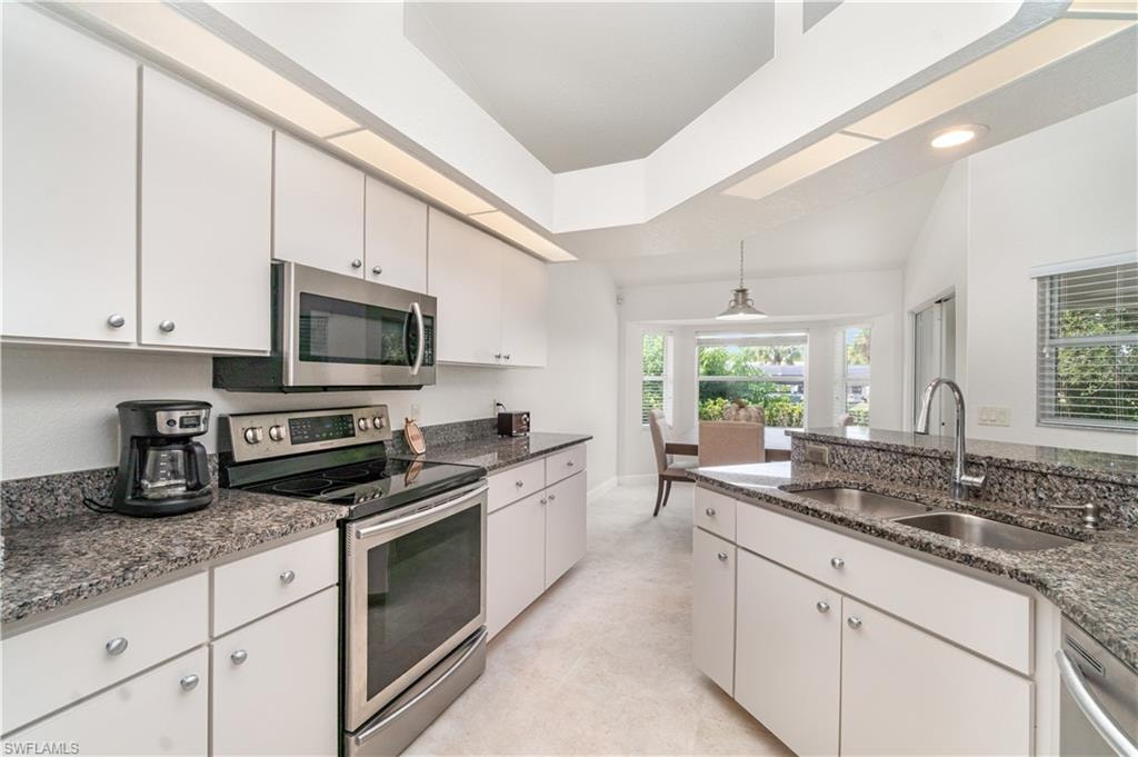 Kitchen featuring appliances with stainless steel finishes