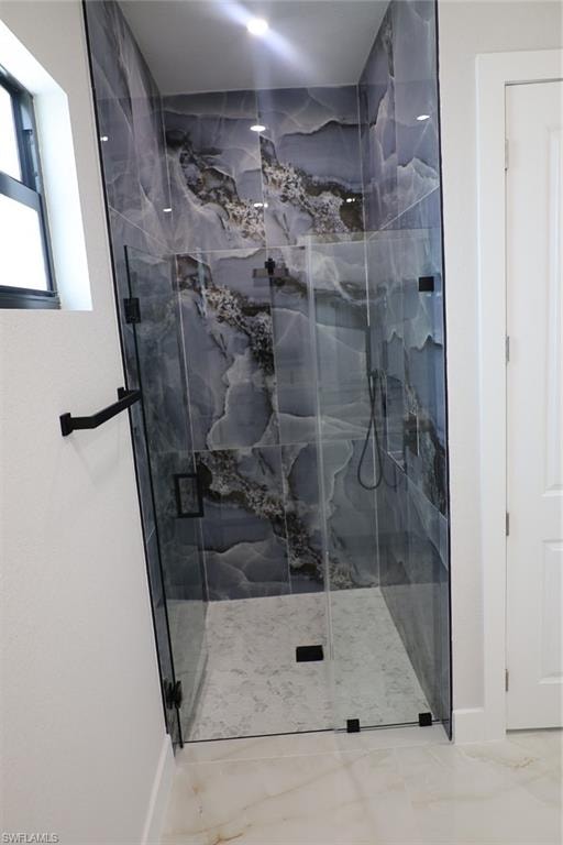 Full bathroom featuring a marble finish shower