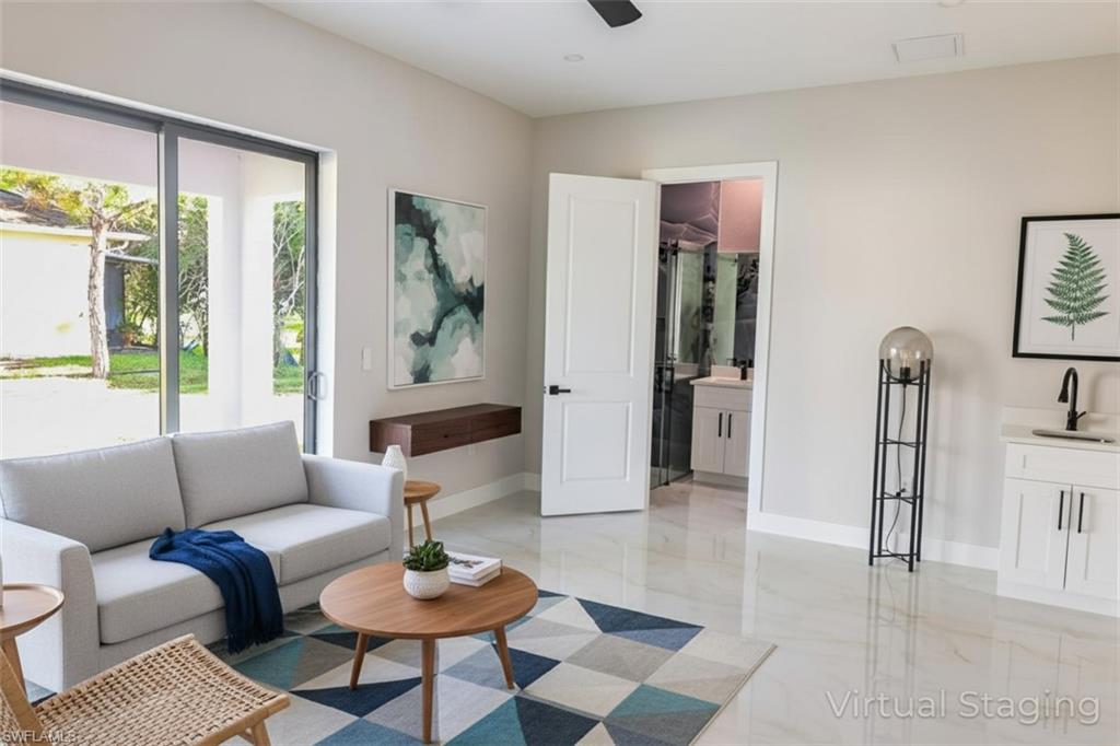 Living room featuring baseboards