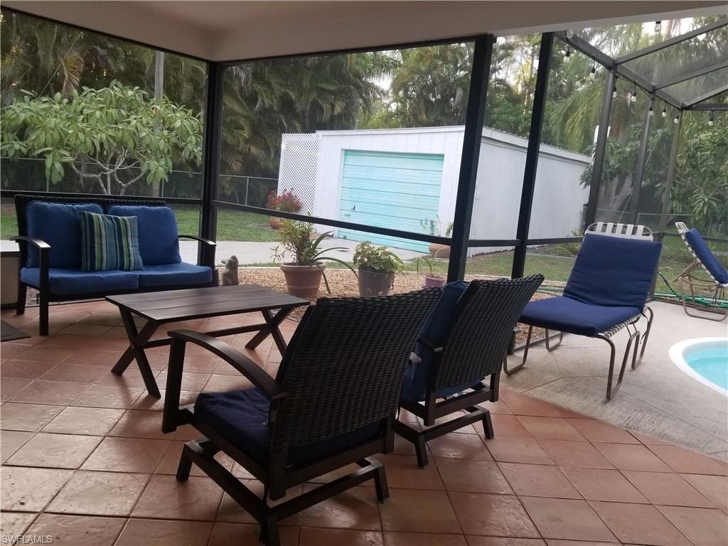 Sunroom featuring a wealth of natural light