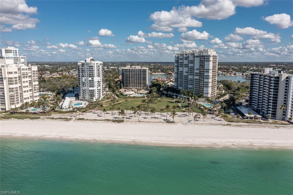 View of urban area with waterfront with a beach